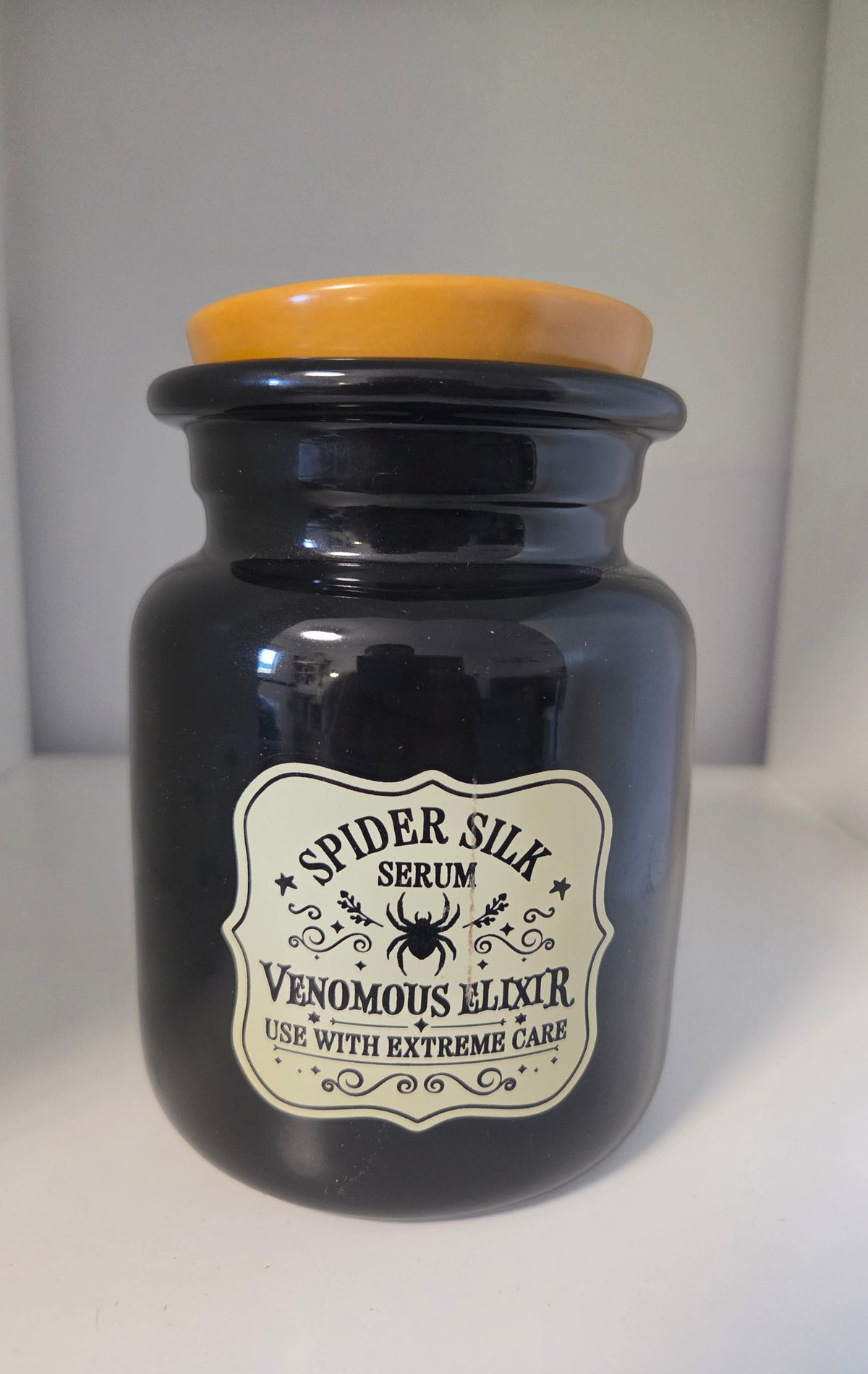 Quemador Bote de Veneno Spider Silk Outlet - vista frontal