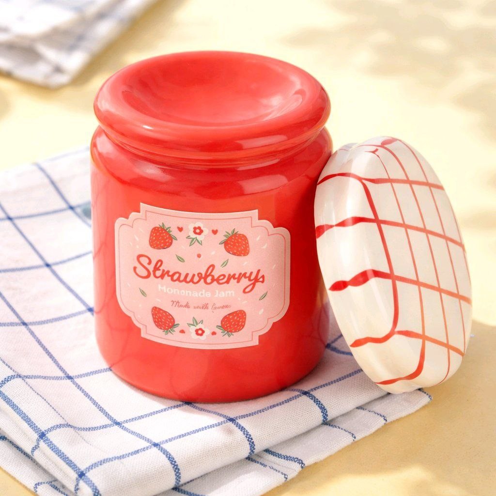 quemador tarro de mermelada de fresa